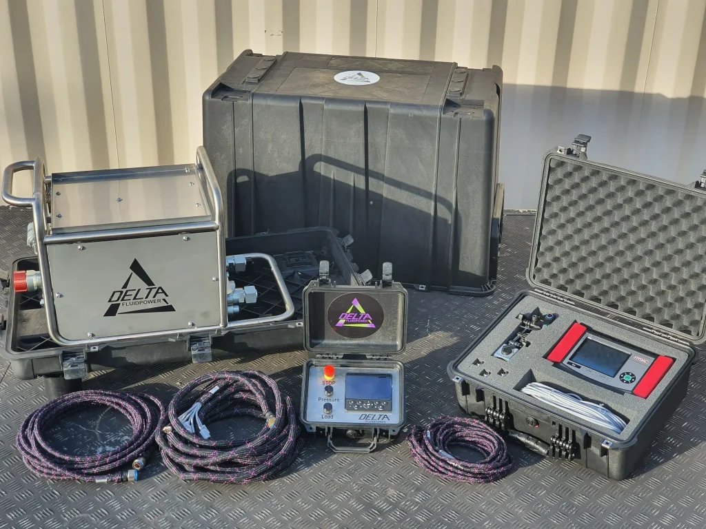 Hydraulic flow meter testing kit by Delta Fluidpower, used for diagnosing and measuring flow rates in hydraulic systems